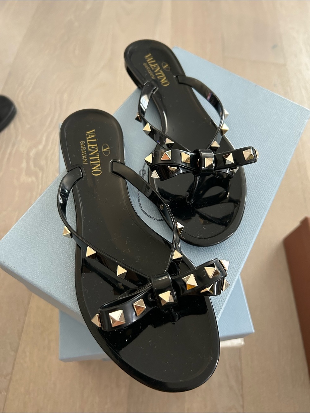 Valentino Black Jelly Rockstud Thong Sandals with Gold Accents
